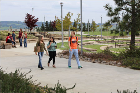 Students walk and mingle on Butte College campus; image courtesy of California Community Colleges Chancellor's Office